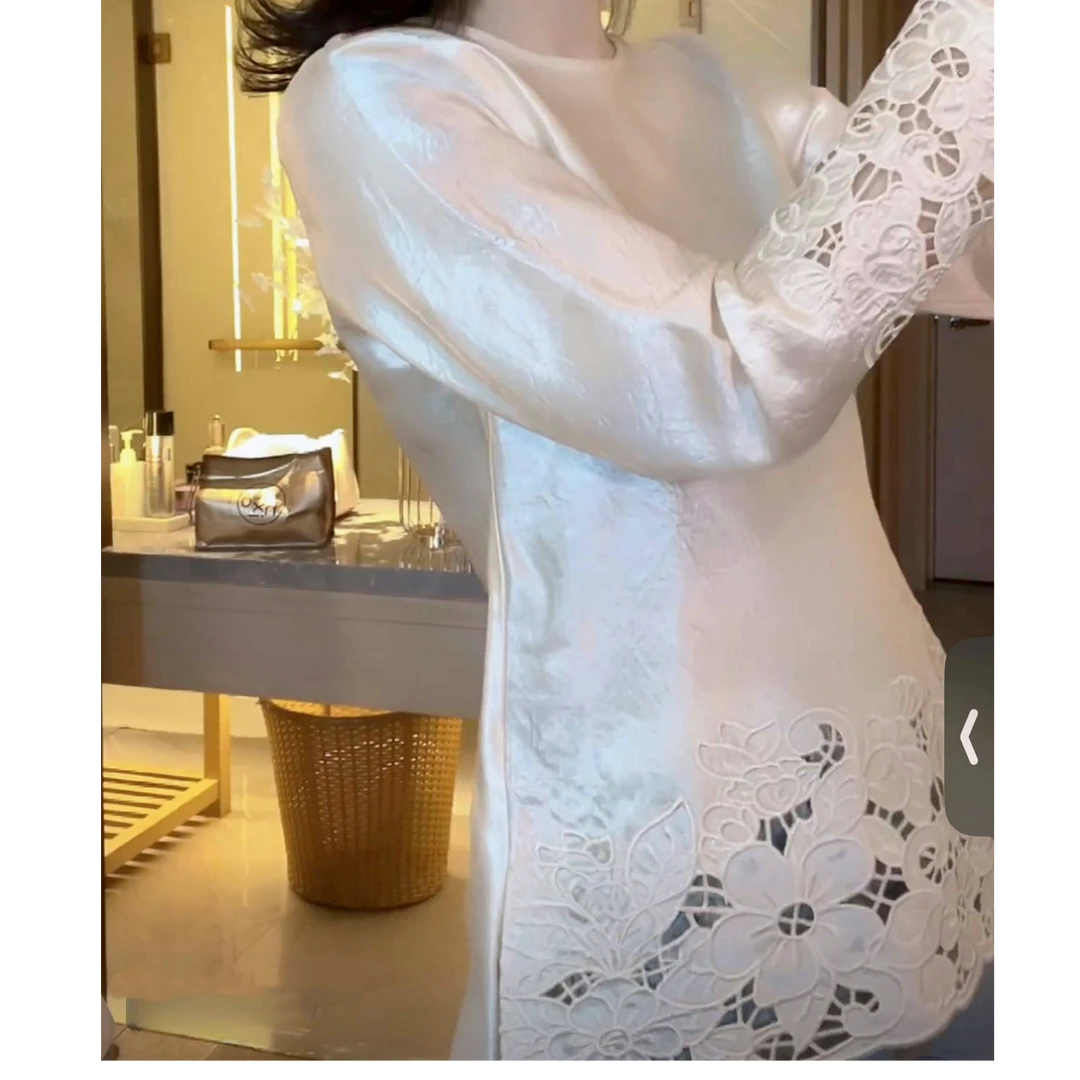 新中式国风下摆镂空上衣2025新款春季简约圆领时尚内搭外穿打底衫