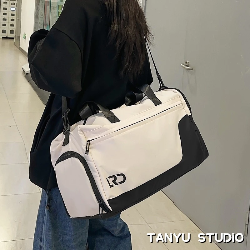 探屿手提旅行包男大容量出差旅游单肩包短途休闲轻便通勤斜挎包女