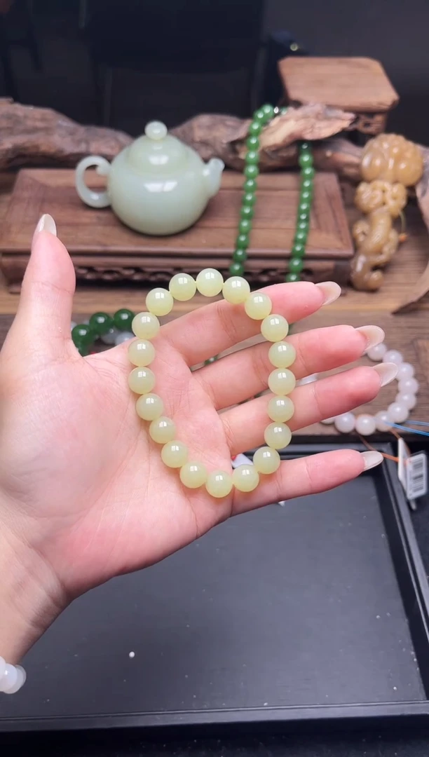 未镶嵌手串和田玉卡10若羌黄口料 圆珠 有瑕疵