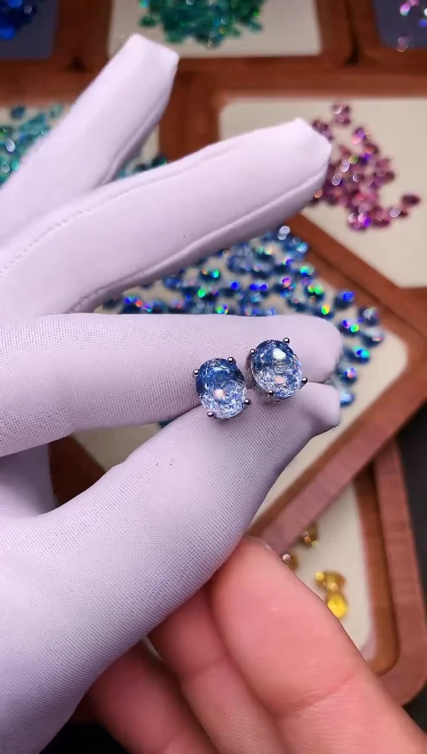 海蓝宝石耳饰银S925镶嵌······