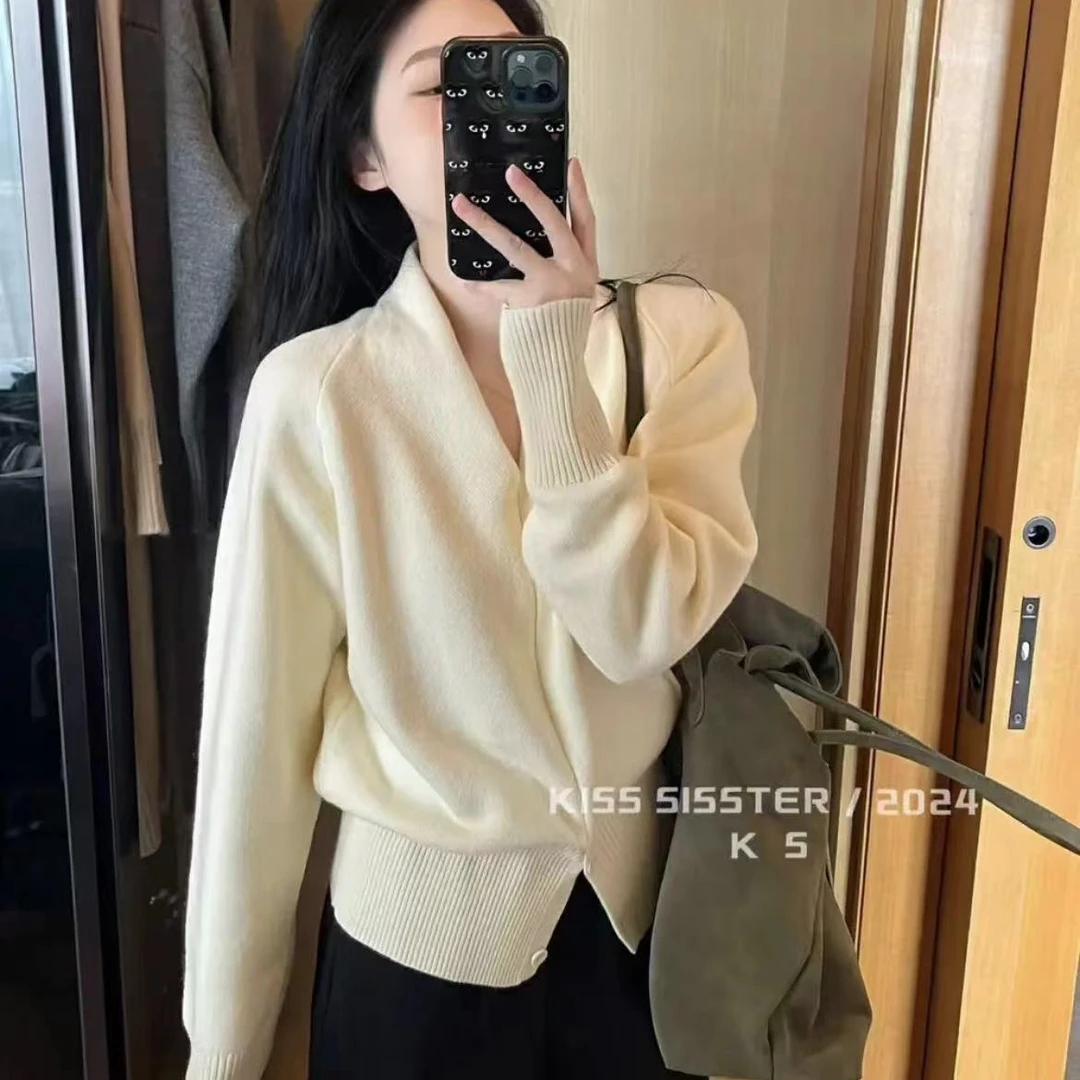 极简风V领显瘦加厚毛衣冬季设计感下摆开叉插肩保暖上衣女