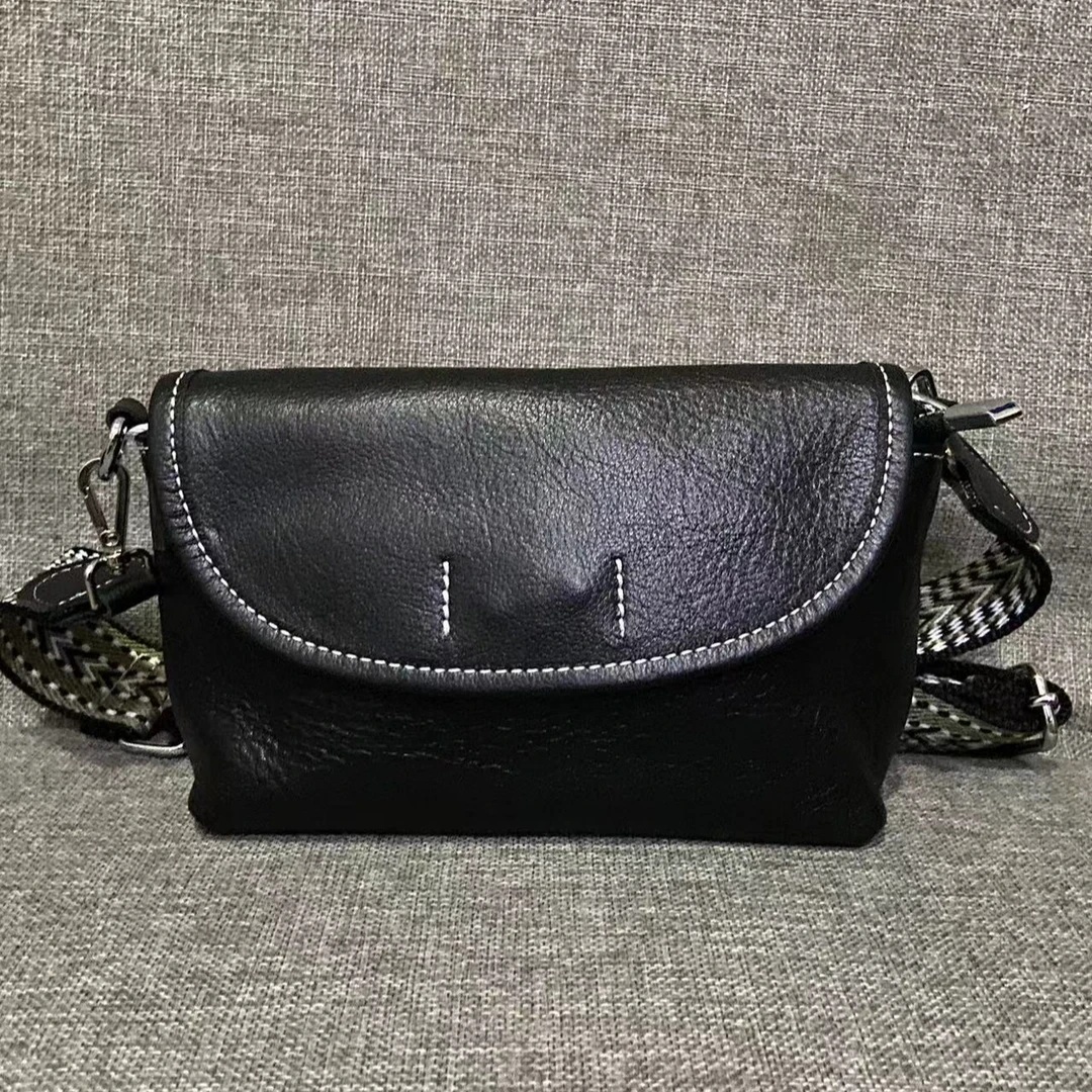 头层牛皮女包手拿包