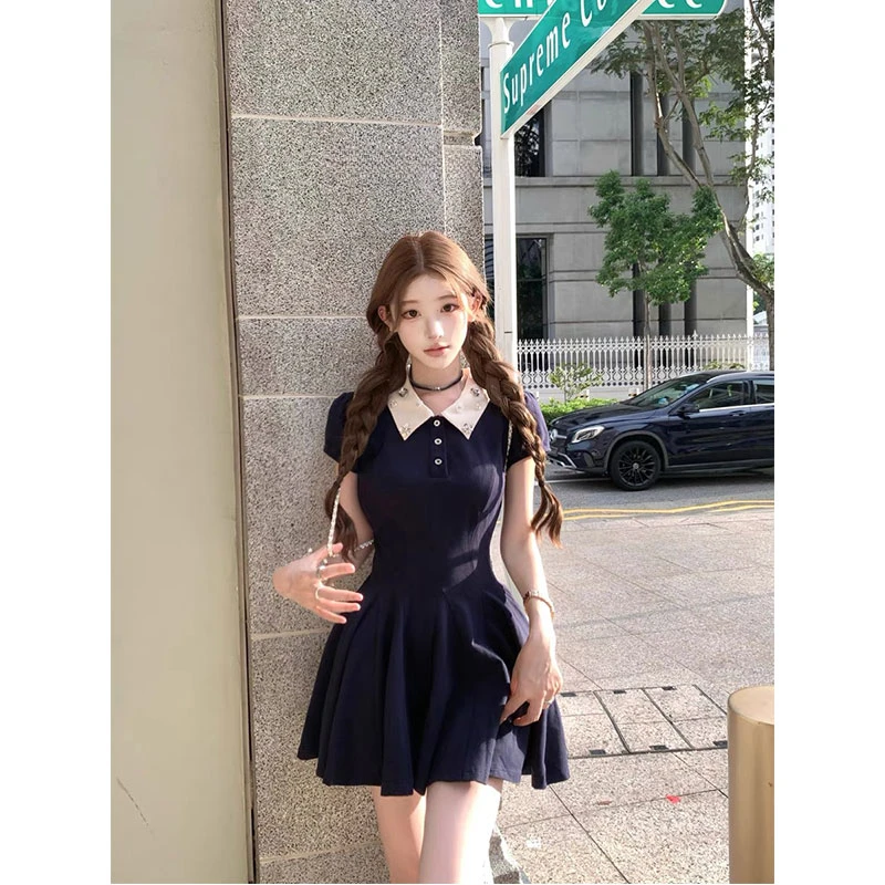 钉钻花朵领polo连衣裙2025夏季新款纯欲性感独特好看收腰a字短裙