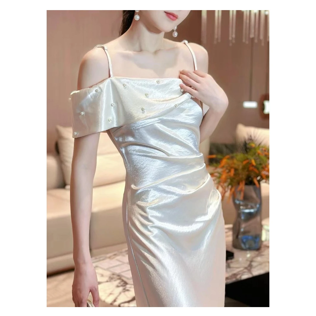 2025新款夏季巨好看气质名媛重要场合长裙白色缎面一字肩连衣裙女