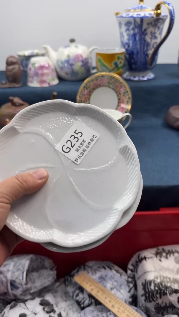 瓷片努**?瓷片   G235