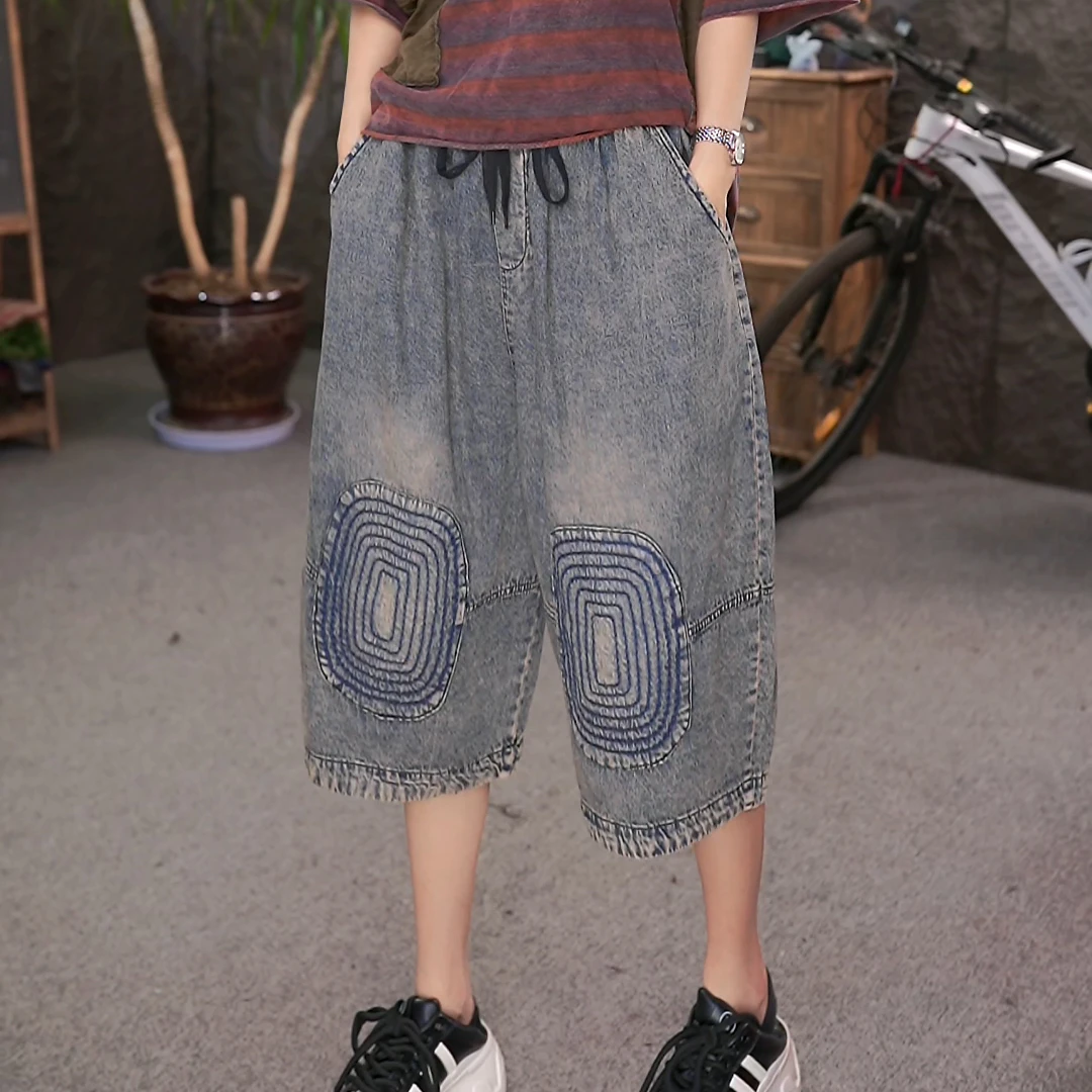 夏季新款个性水做旧洗磨白刺绣牛仔六分裤宽松大码休闲哈伦裤女潮