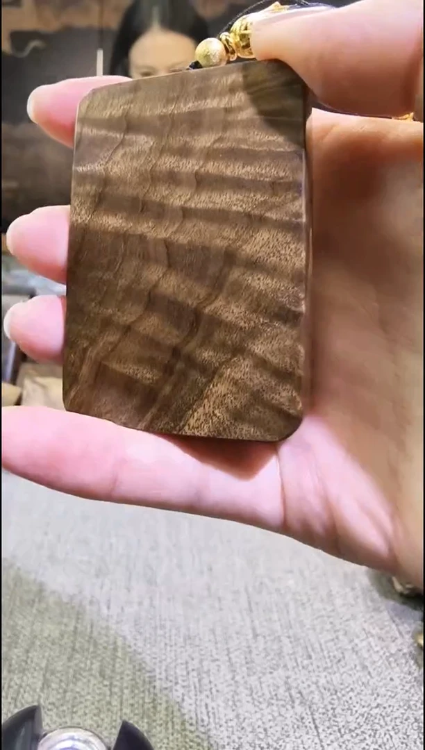 金丝        楠无事牌手把件