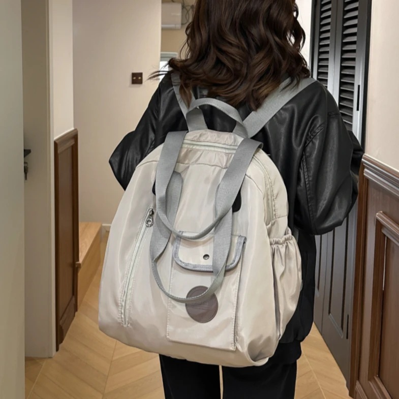 尼龙布双肩包女大容量上课学生书包韩版潮流单肩轻便旅行收纳包