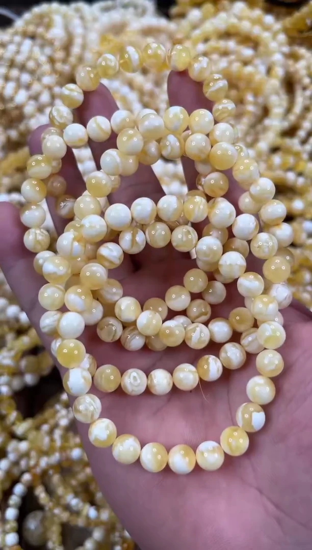 未镶嵌琥珀裸石AA12  8左右圆珠 多样性一条