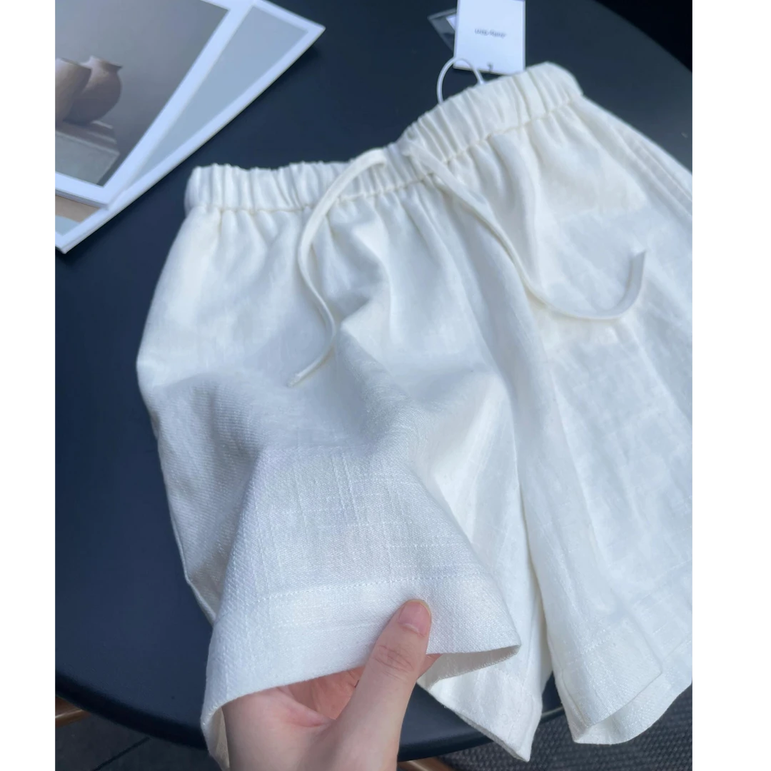白色棉麻阔腿短裤女夏季松紧腰抽绳热裤小个子亚麻a字显瘦五分裤
