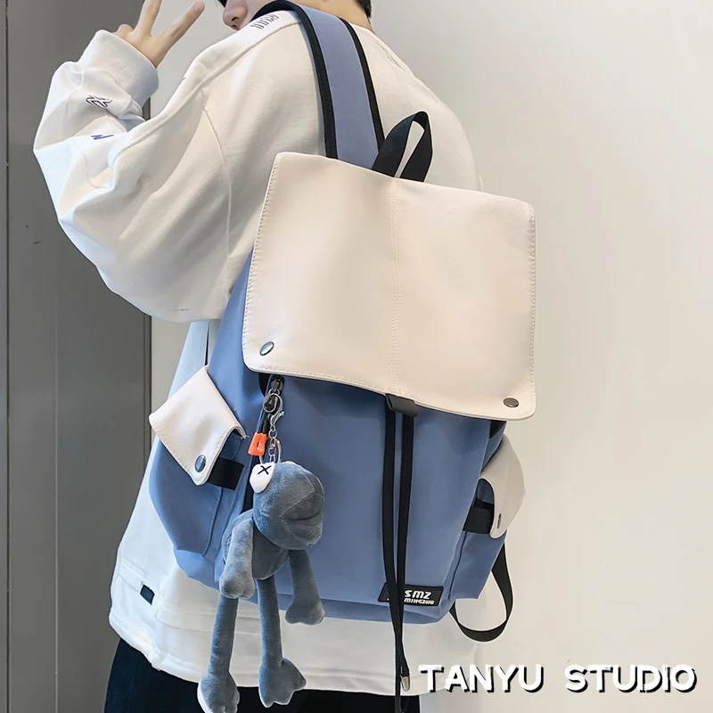 探屿书包潮酷男双肩包大学生时尚简约休闲大容量男士潮牌双肩背包