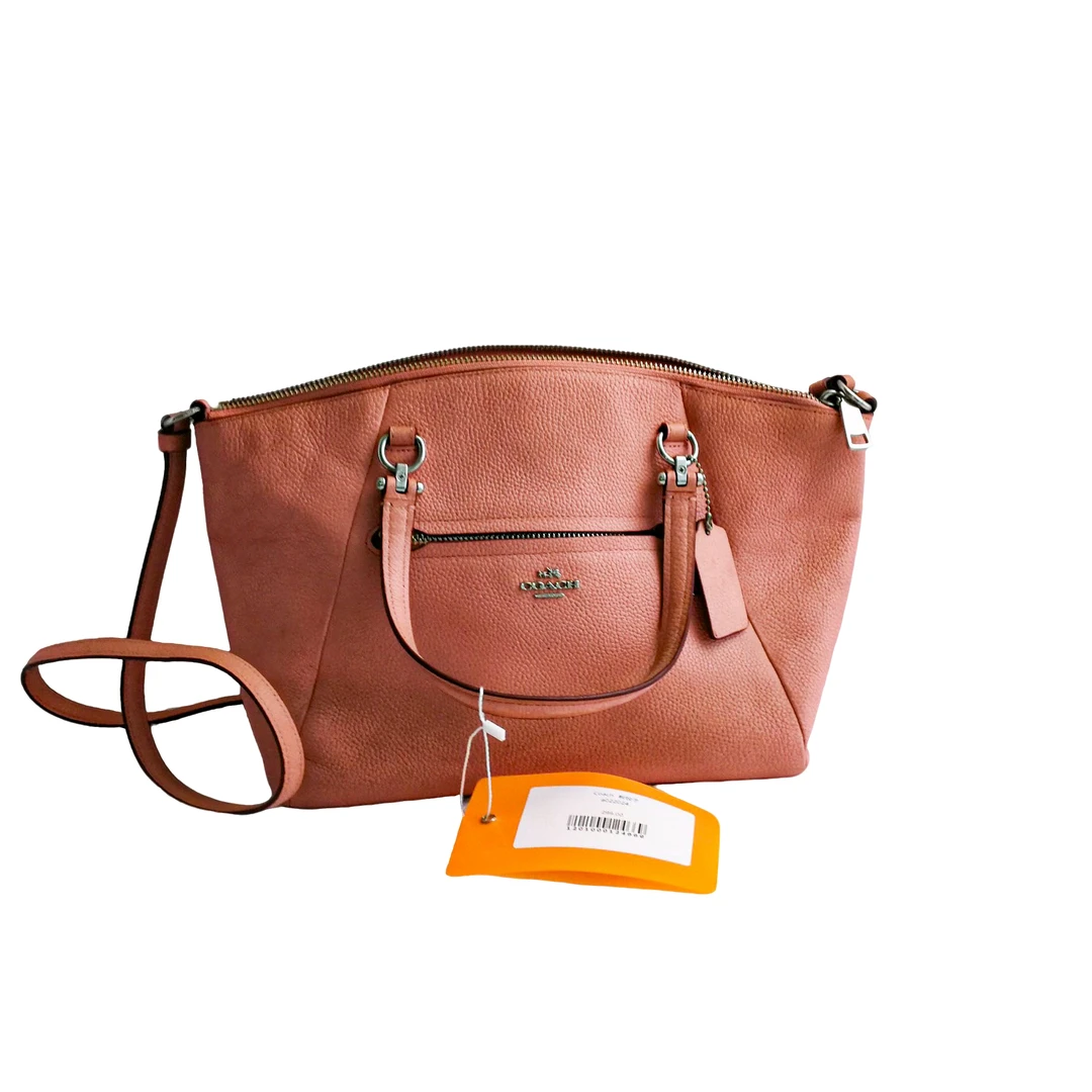 95新 COACH/蔻驰 coach 粉色饺子包  a022024