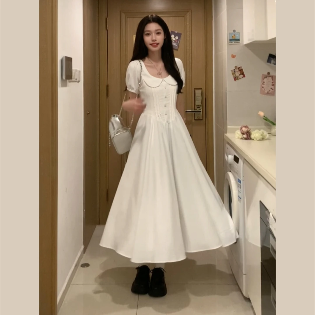 娃娃领白色气质温柔收腰连衣裙女夏季新款短袖度假文艺风长裙子-3