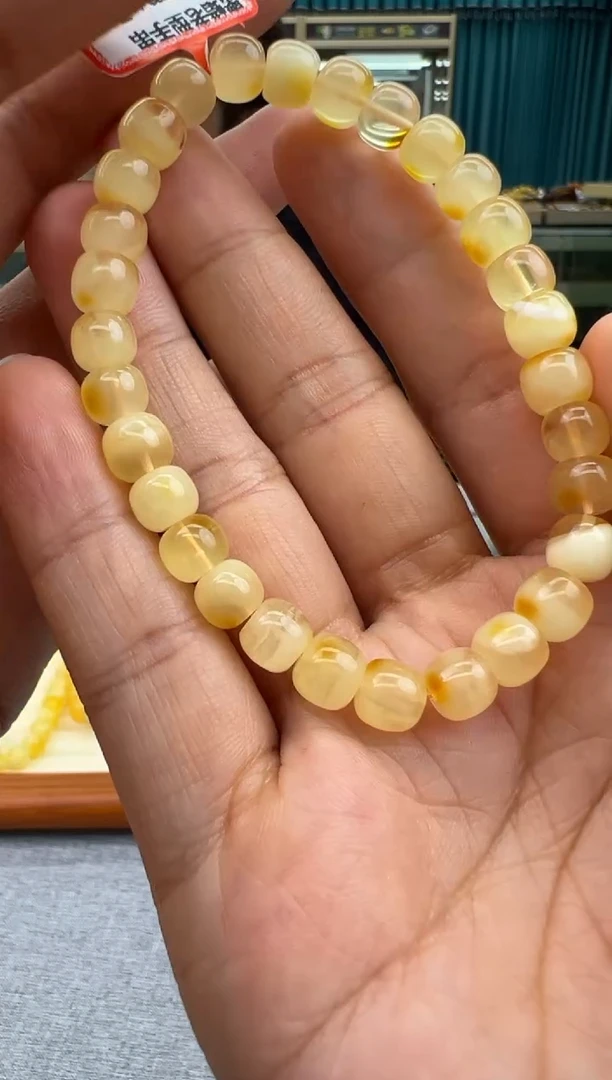 未镶嵌琥珀手链8秒拍号 假一罚三