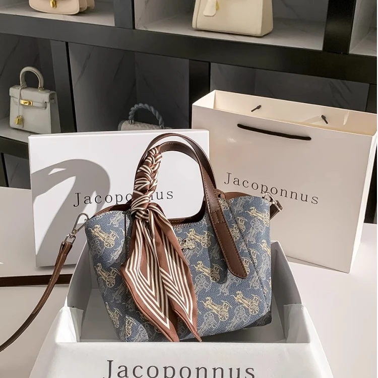 真皮法式菜篮子包女士手提2025新款高级感轻奢小众斜挎通勤水桶包