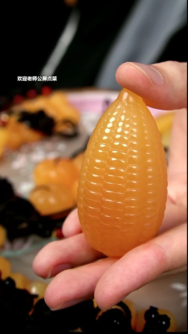 印尼石玉米手把件