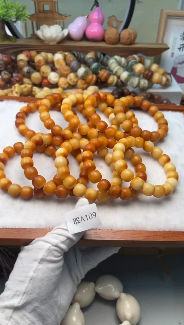 【闪购商品】菩提根/象牙果手串瑕A109干磨桶珠13mm一串随机