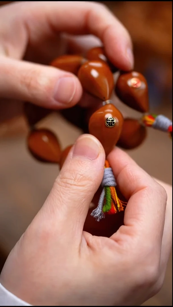 手串/手链橄榄核6籽带标手捻（标色随机）