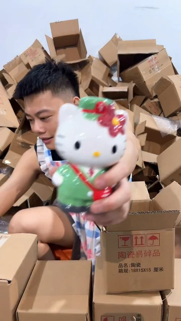 瓷片绿色kt猫邮递员存钱罐