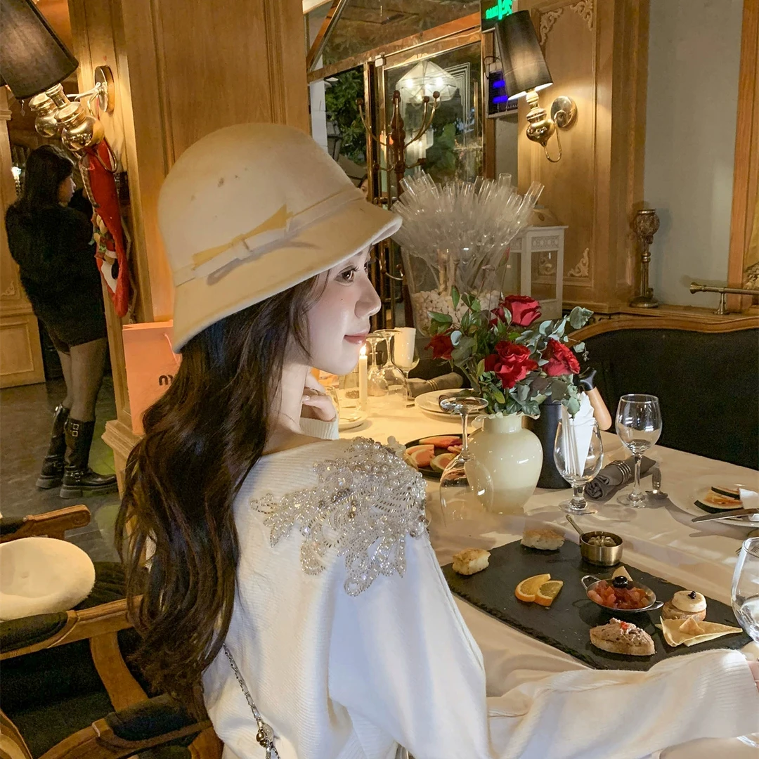 鱼兔子的兔子25春秋新款时尚高级内搭羊绒衫女露肩侧边褶皱针织衫