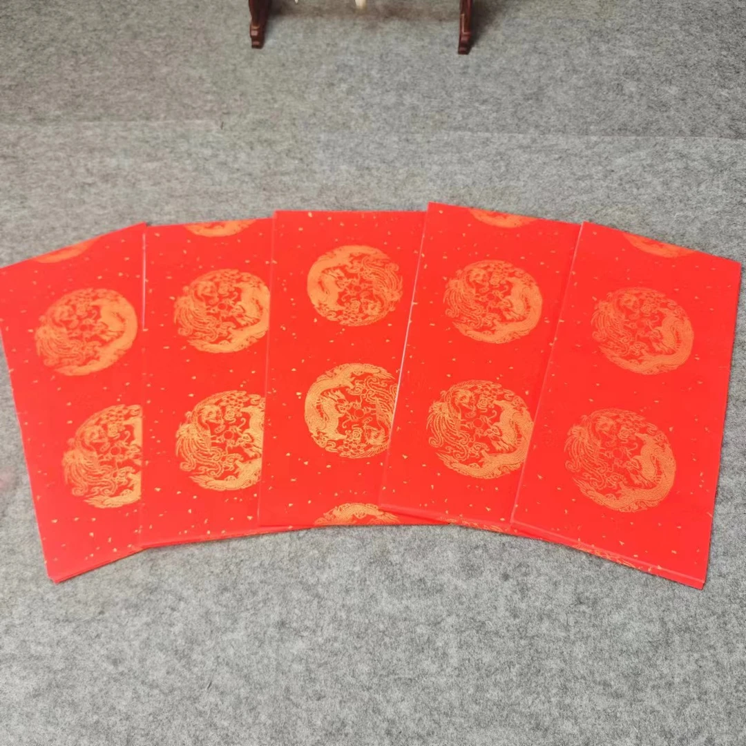 17*105万年红宣纸对联龙凤花纹10袋