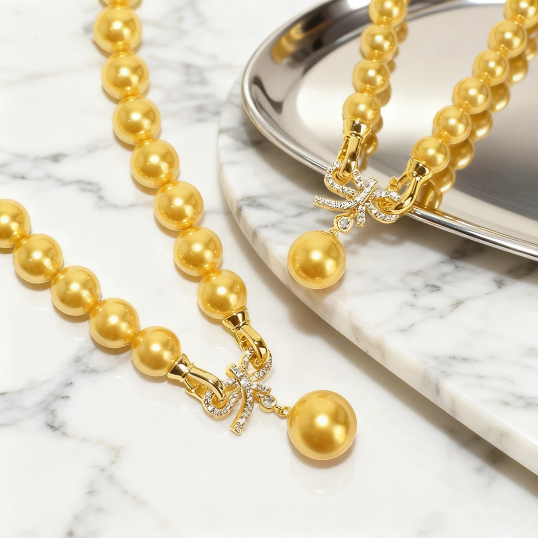 铜合金仿珍珠项链 10+14mm金色蝴蝶结款施家贝珠项链XLA315