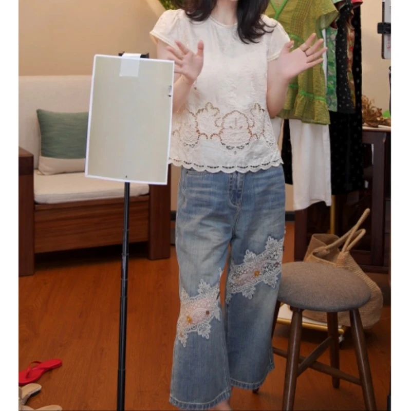 简约百搭镂空蕾丝拼接短袖+高腰百搭牛仔裤LK2504586
