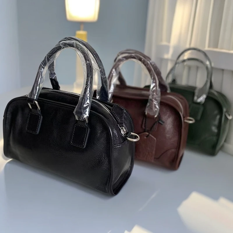 新款植鞣牛皮中保龄球百搭极简枕头包女单肩斜跨手提小方包61266