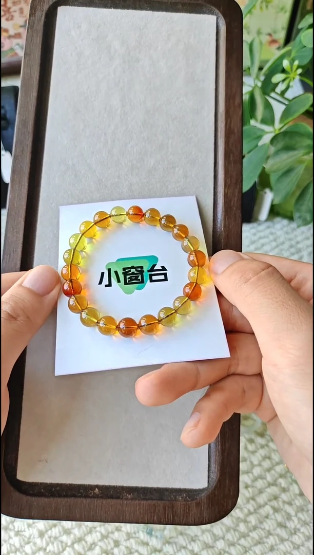 手串琥珀未镶嵌v****?琥珀手串未镶嵌