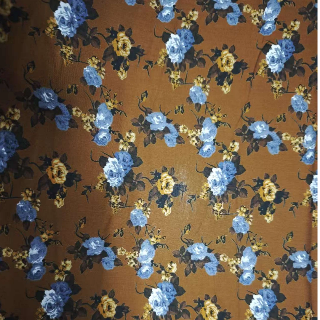 雕印棉绸棕底蓝花面料（不支持七天无理由退换）