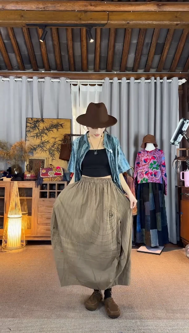 x****阳设计师款咖色半裙