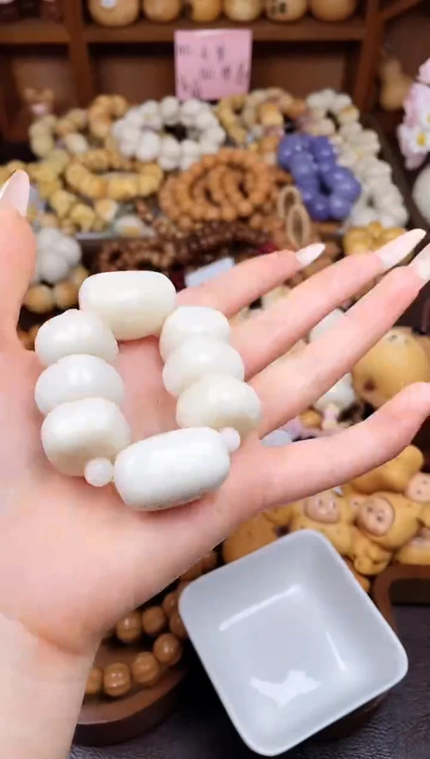 手串菩提根/象牙果Q白色方扣双排扭扭乐