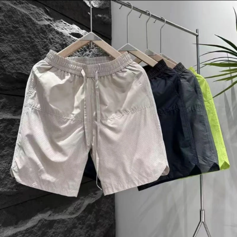 夏季新款激光打孔透气休闲短裤男简约时尚百搭宽松速干冰丝五分裤