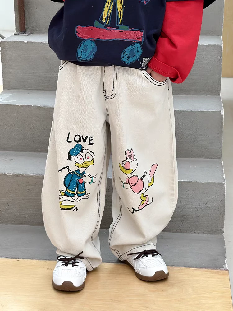 趣味卡通白牛仔男童春装裤子2025新款痞帅风春秋款潮酷儿童牛仔裤