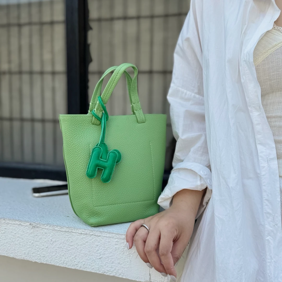 头层牛皮水桶包包女2025新款高级感小众手提菜篮子包斜挎包托特包