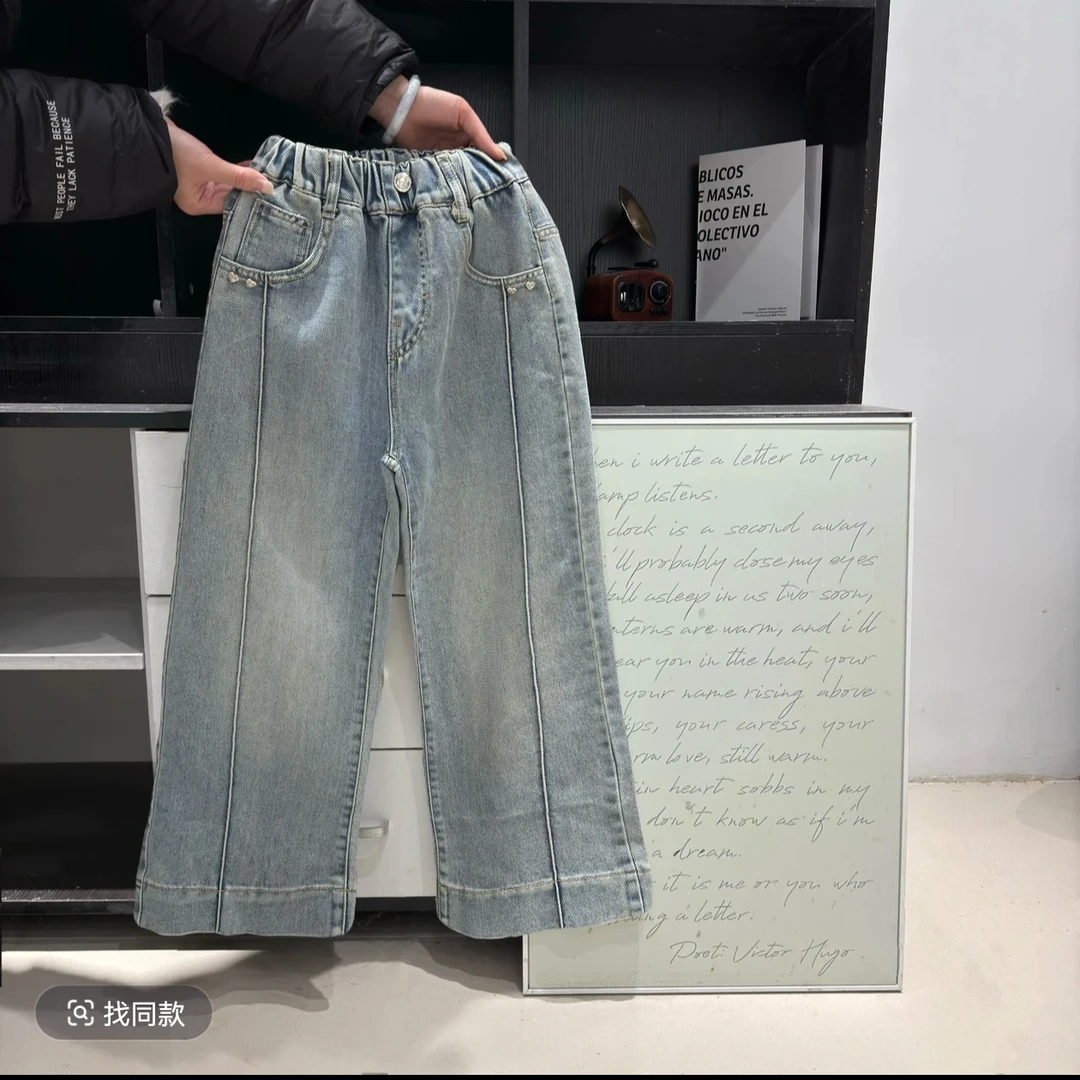 C2888春秋后袋粉标花朵牛仔裤