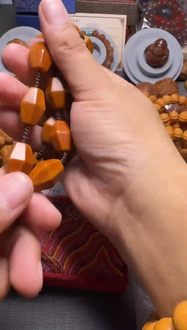 橄榄核手串十八棱脖挂