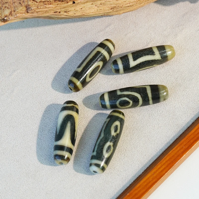 LZ009天然玛瑙牙黄40长图腾天珠裸珠（多样性发货，发其一）