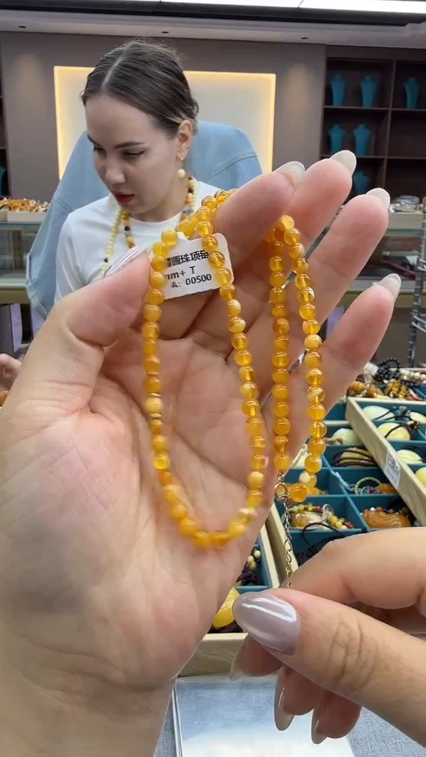 琥珀颈饰未镶嵌36秒拍号 假一罚三