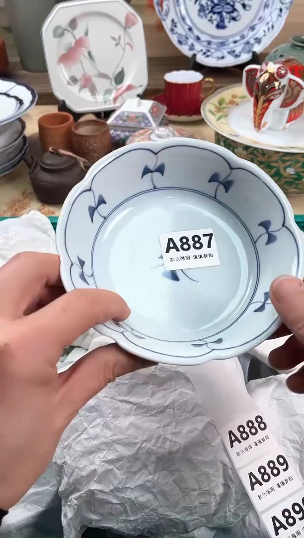 瓷片周**界887