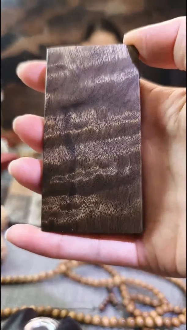 金丝        楠无事牌手把件