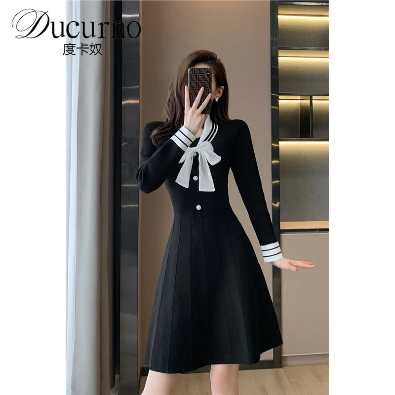 法式针织连衣裙女2025秋季新款复古气质蝴蝶结V领收腰显瘦小黑裙