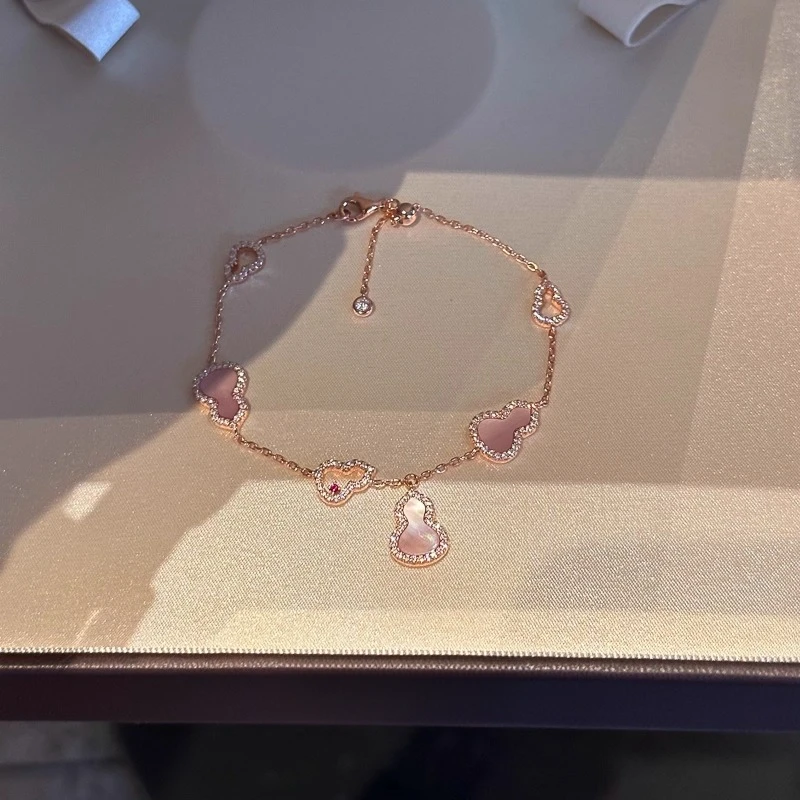铜合金手链 玫瑰金粉贝壳满钻镂空葫芦手链女轻奢高级感抽拉手饰