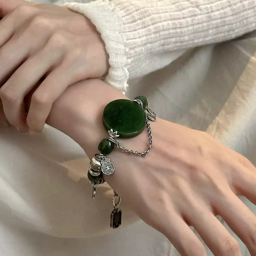 925银手链 S11536 绿色圆形无事牌金木水火土雨渐耳祥云扣手链女