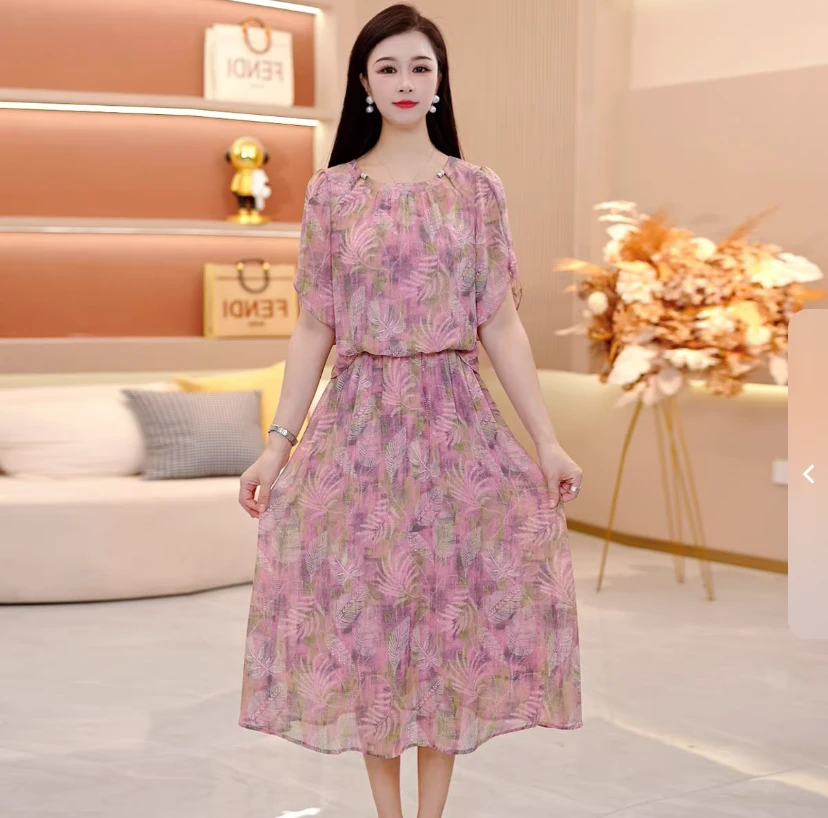 2025年夏季新款轻薄透气圆领花色连衣裙气质显瘦优雅中长裙