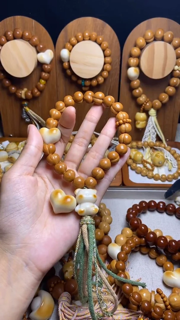 手串猴头核桃珈*全品龙炎爱心橄榄壳紫咖流苏