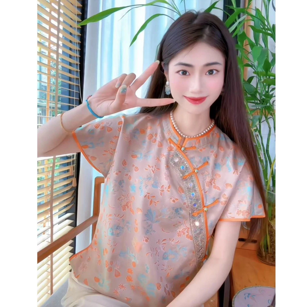 4448橘色异色萝上衣