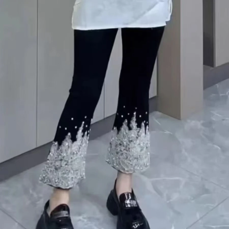 欧潮明娟s6035早春新款重工银色亮片微喇九分裤喇叭裤春季