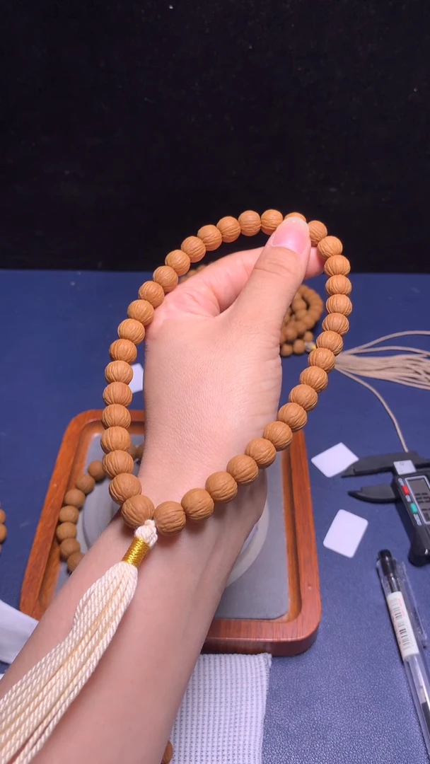 猴头核桃手串吊**王10精修凤羽