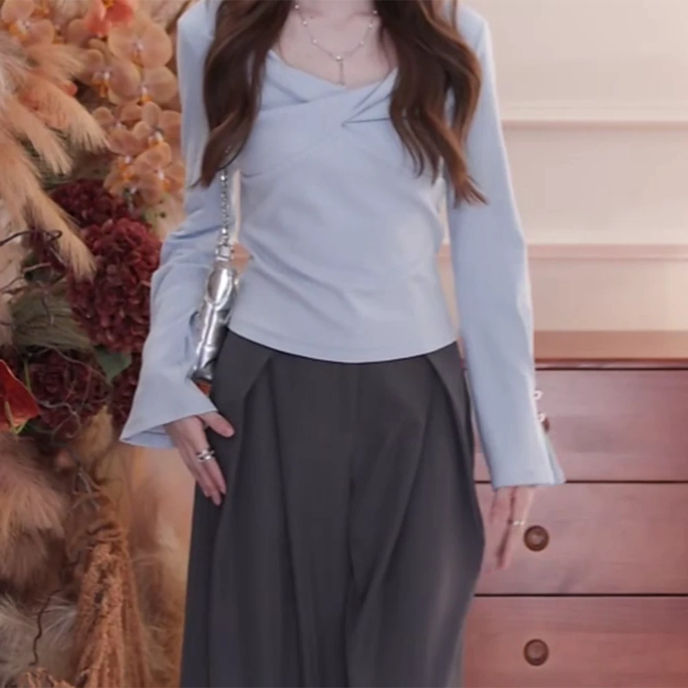 蓝色纽结正肩长袖t恤女设计感休闲时尚气质小众修身百搭上衣C6310